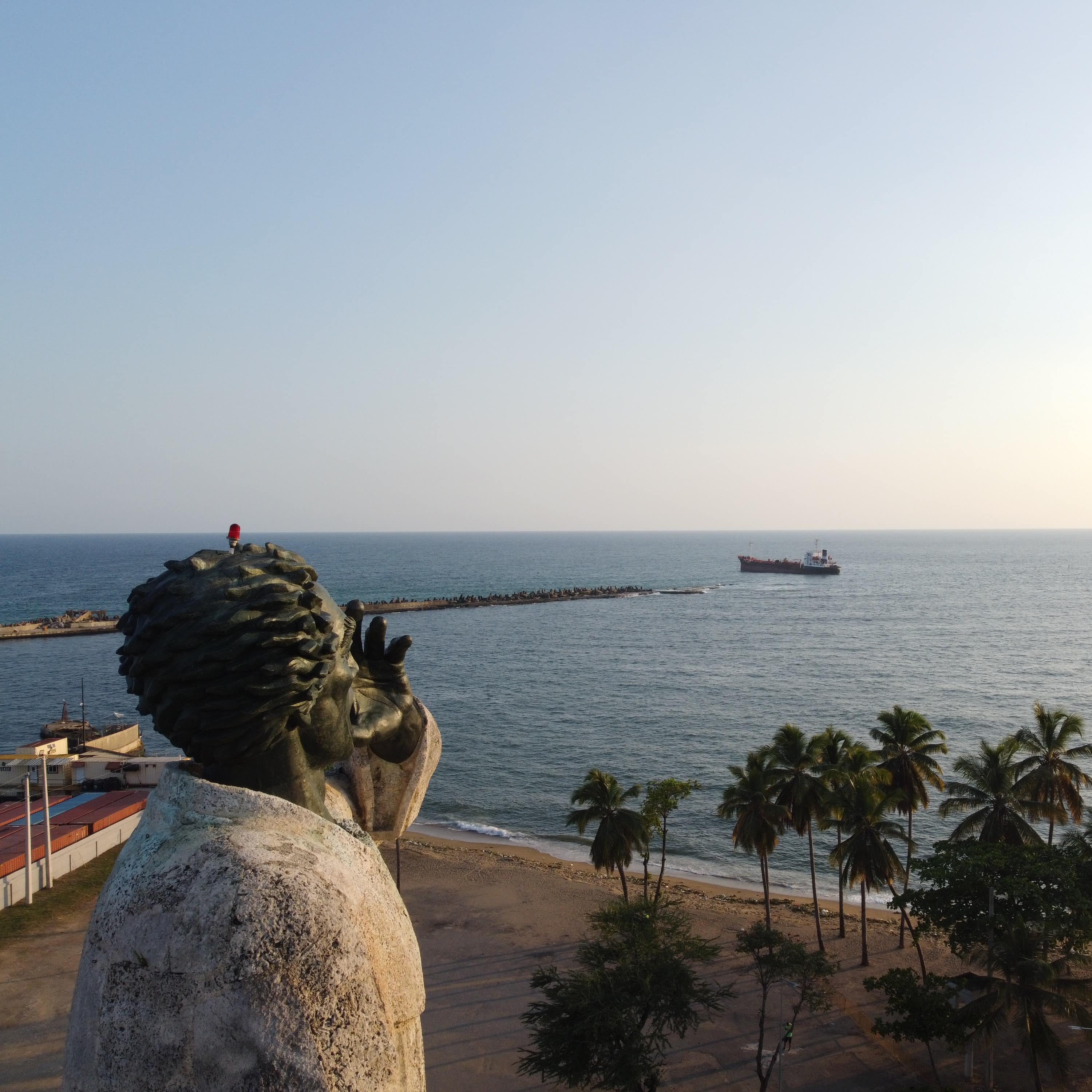 Monumento de Fray Anton de Montesinos, Santo Domingo, Dominican Republic with a clear view of the ocean
