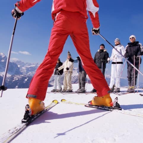 Ski instructor teaching before everyone makes their way down the slopes