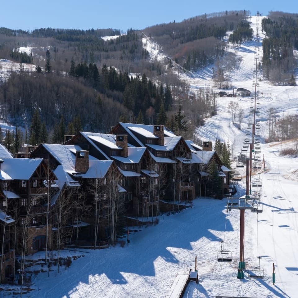 Snow covered mountain range, ski resort and ski-lift in Vail, Colorado, USA