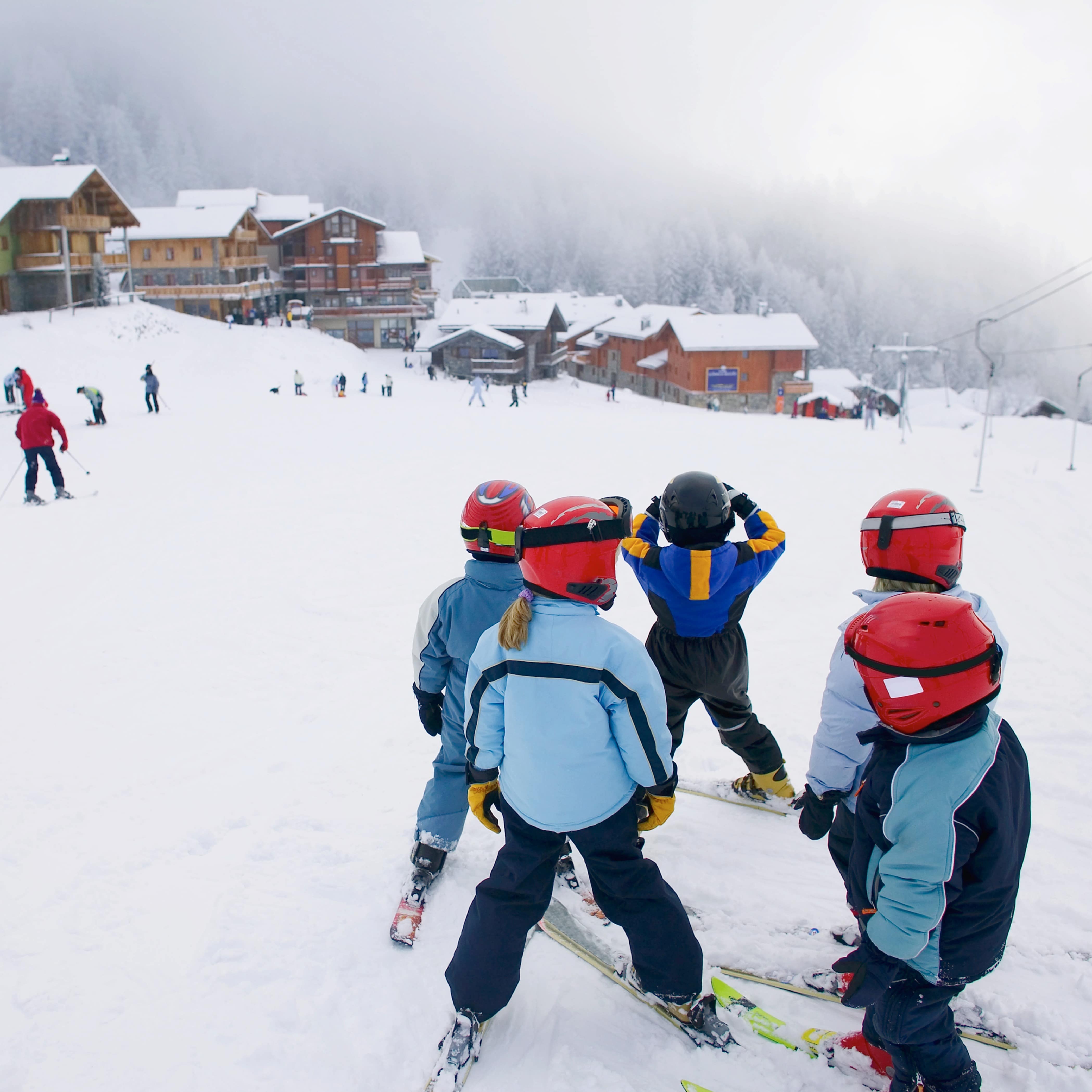 Group of kids gathering before skiing