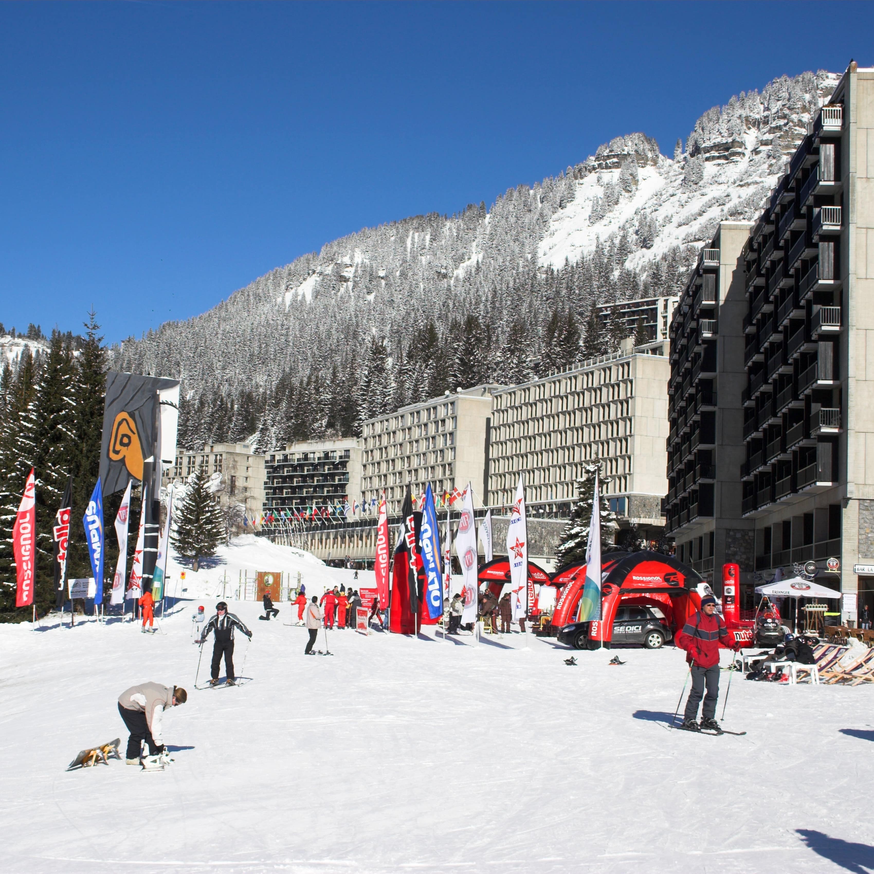 Grand Massif ski resort in front of snowy mountains