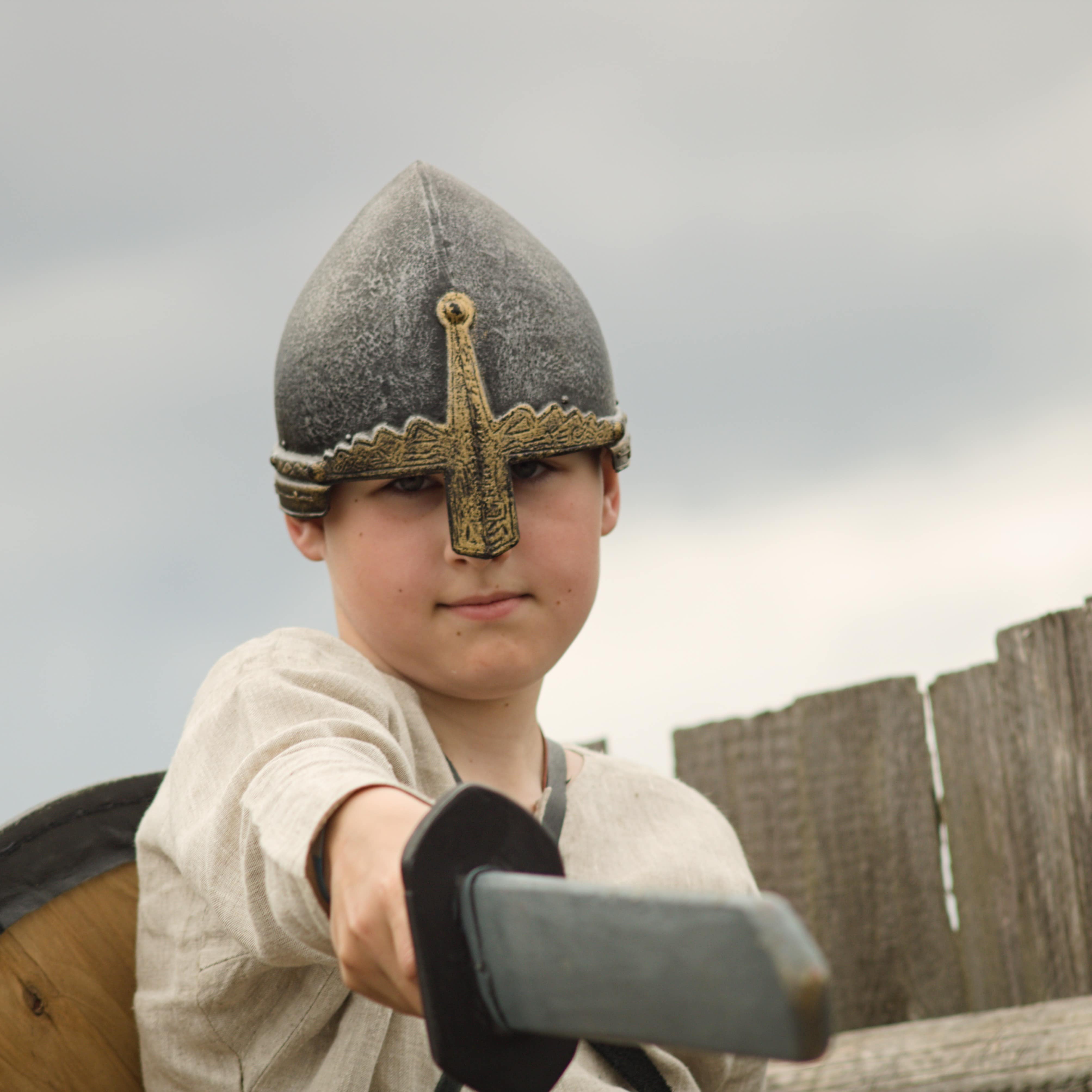 Little boy in medieval-style costume