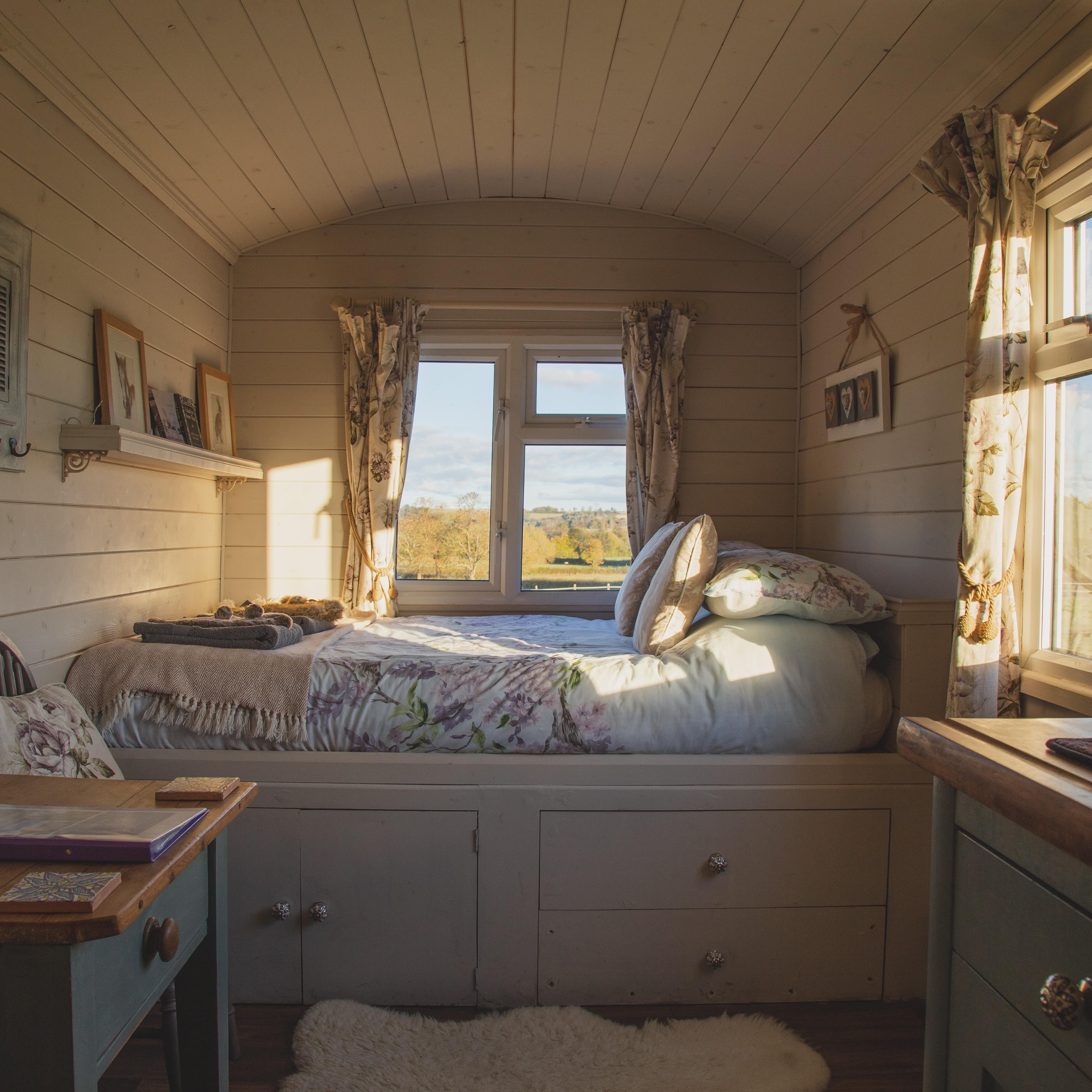 Bed and indoor view of a tiny house