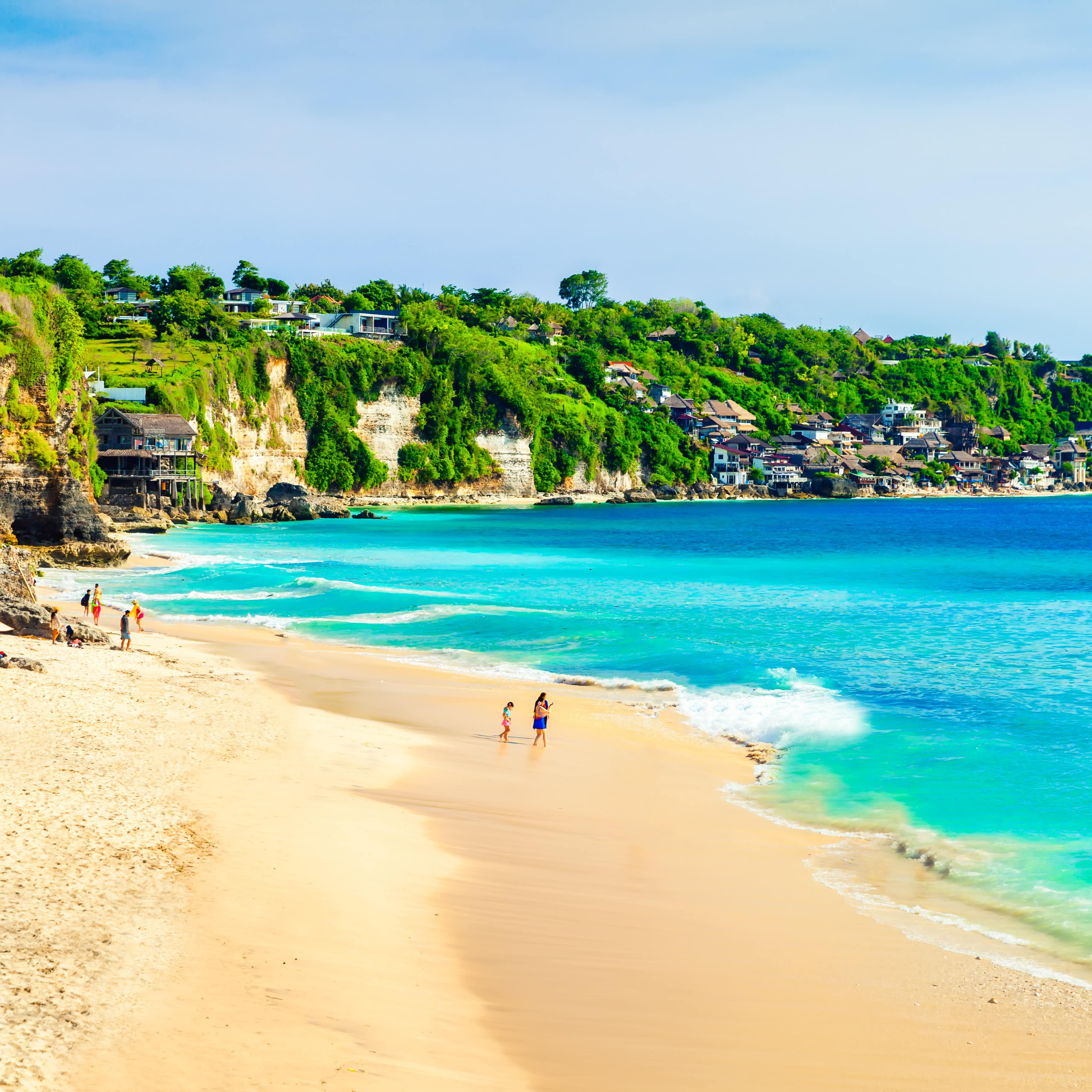Seascape of Bali with white shores and crystal clear blue water