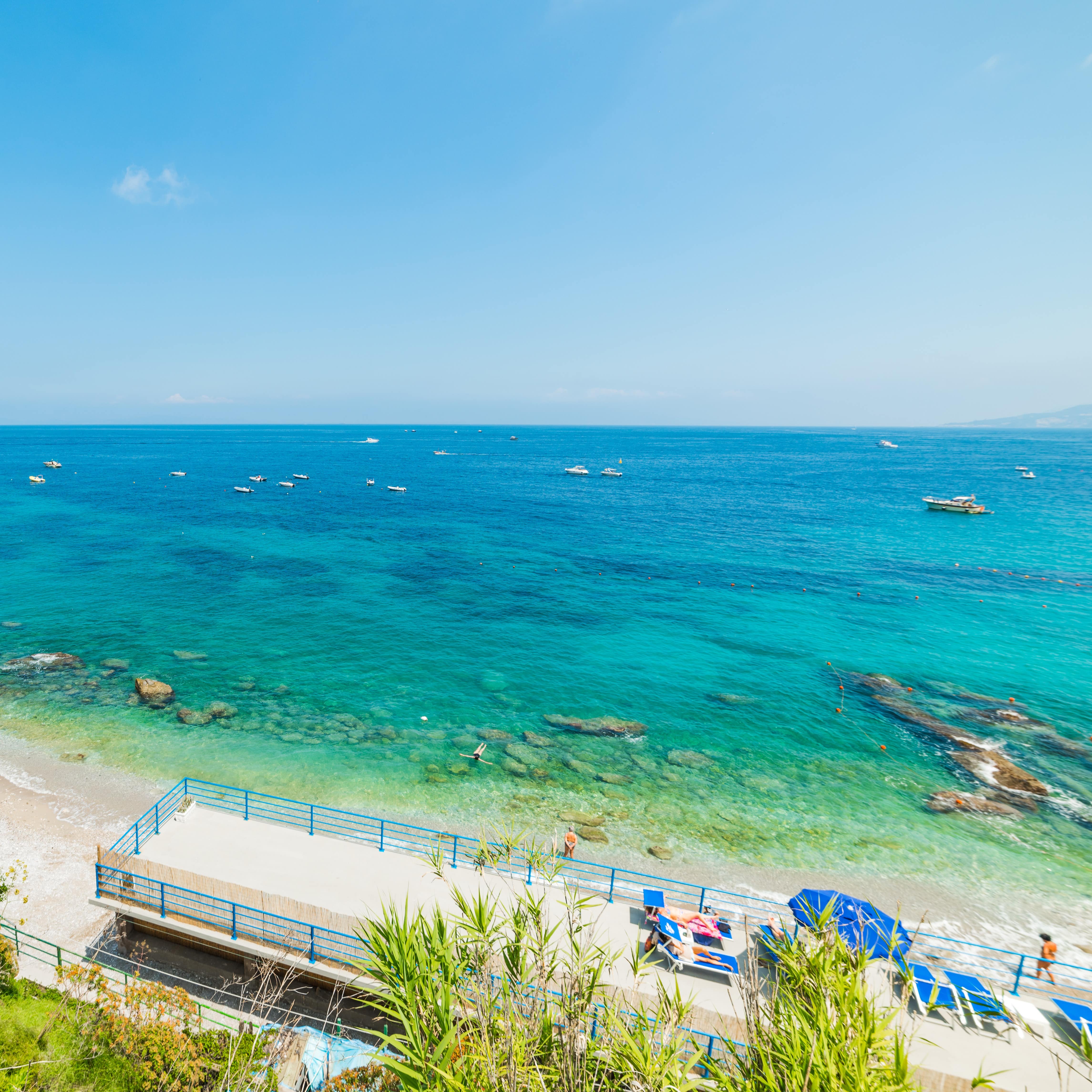 Shoreline against a bright blue ocean view