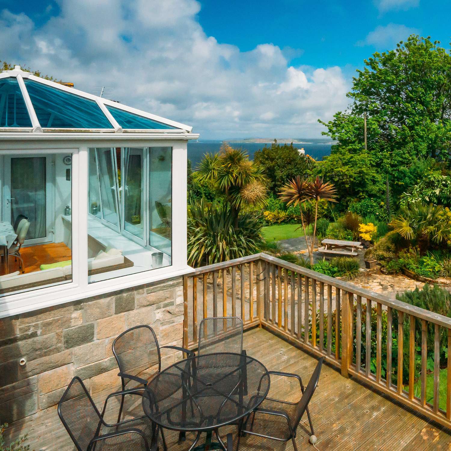 Sea view detached family home with glorious gardens and path to the beaches