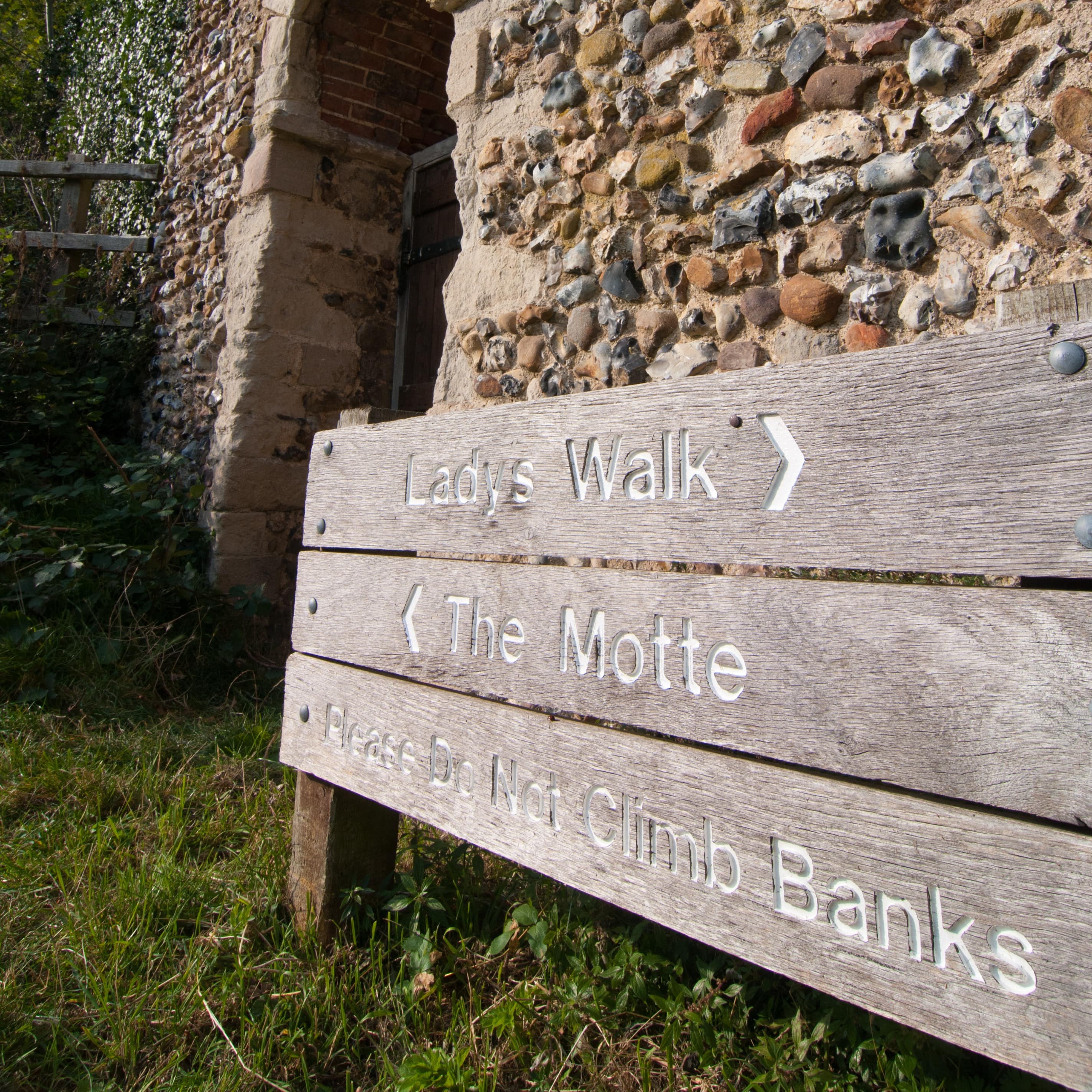 Signposts for Lady's Walk and The Motte at Clare Country Park