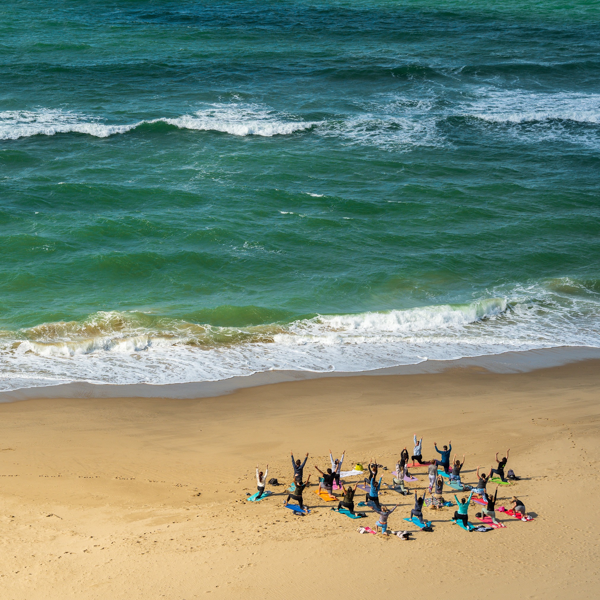 Yoga class on the sandy beach of Bournemouth