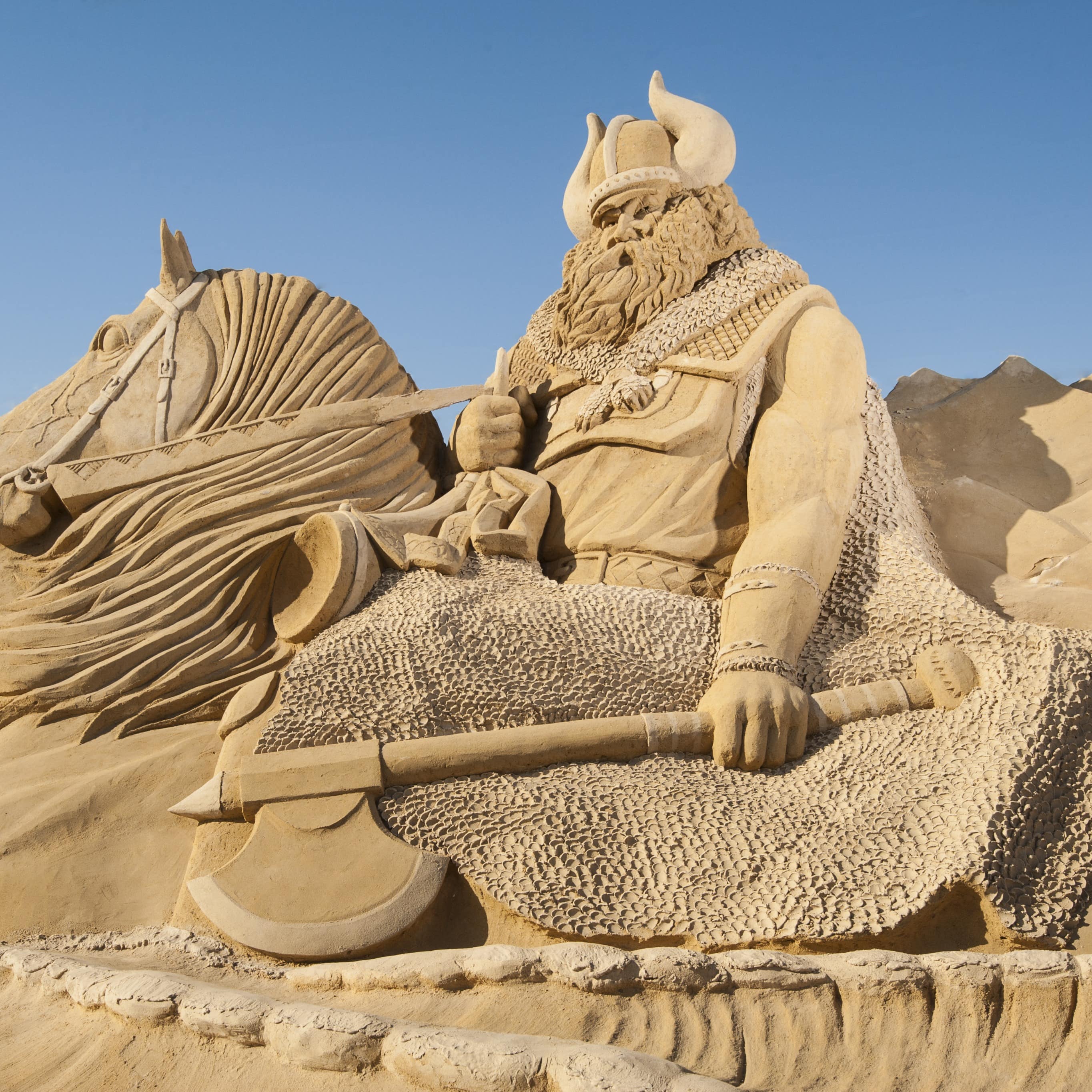 Large sand sculpture of Norse viking