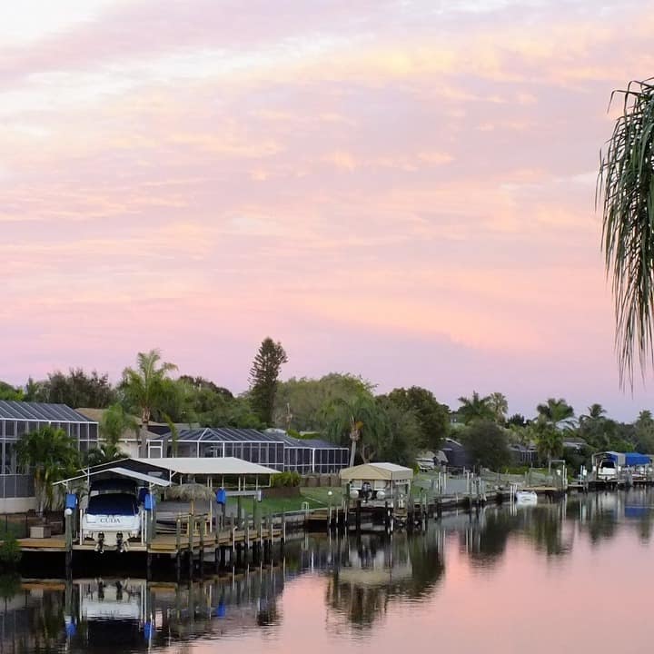  The waterways of Cape Coral, lined with boats and luxurious houses