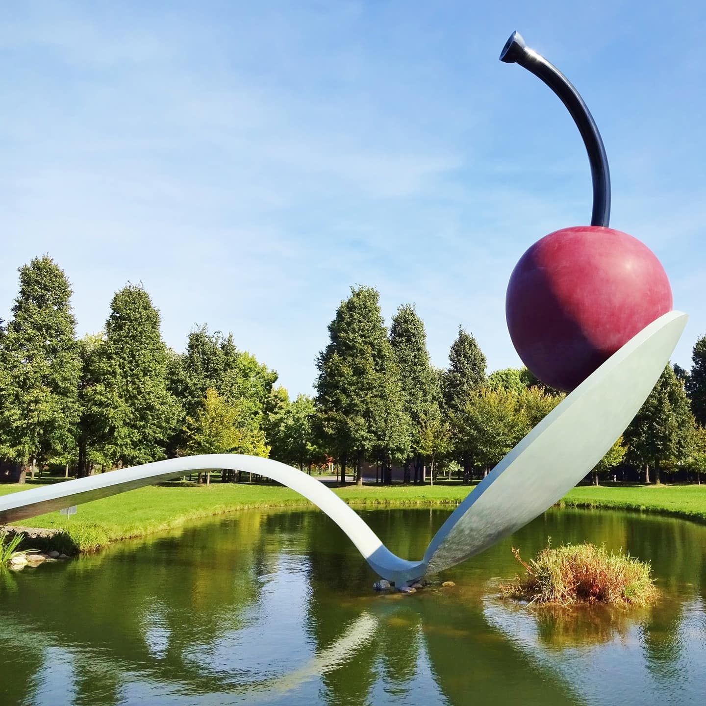 A giant cherry on a spoon at Minneapolis Sculpture Garden