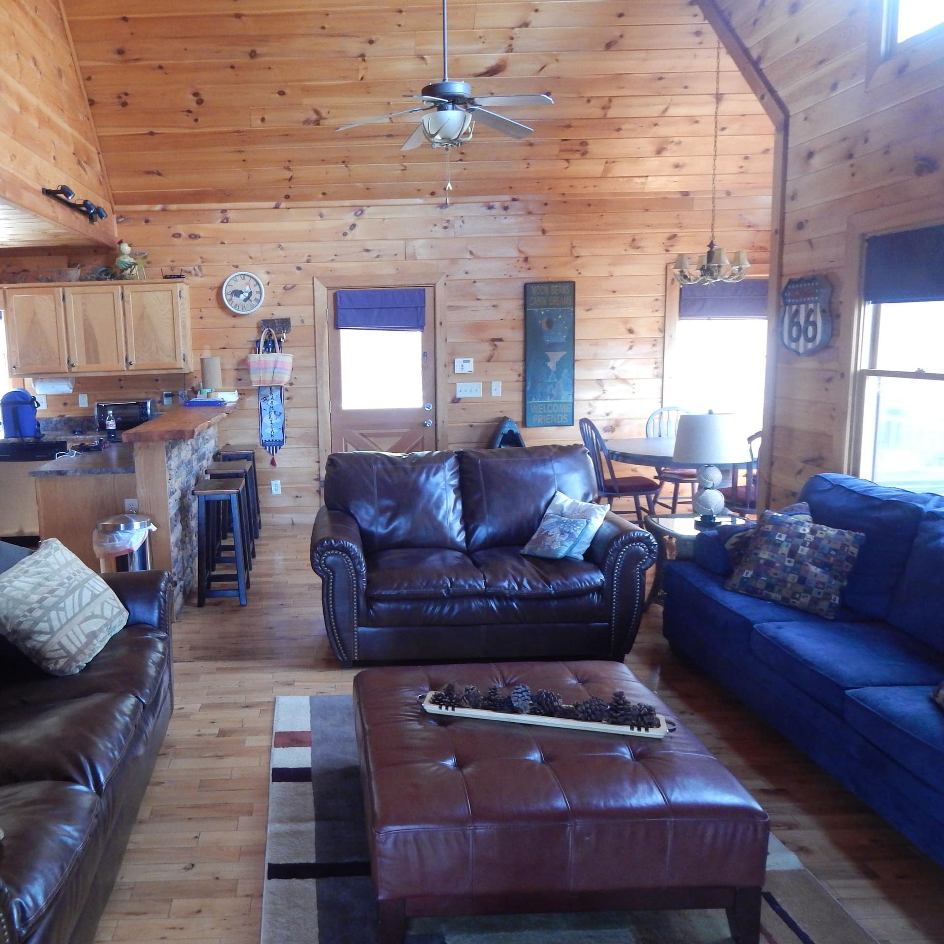 Spacious wood cabin living space with lots of natural light
