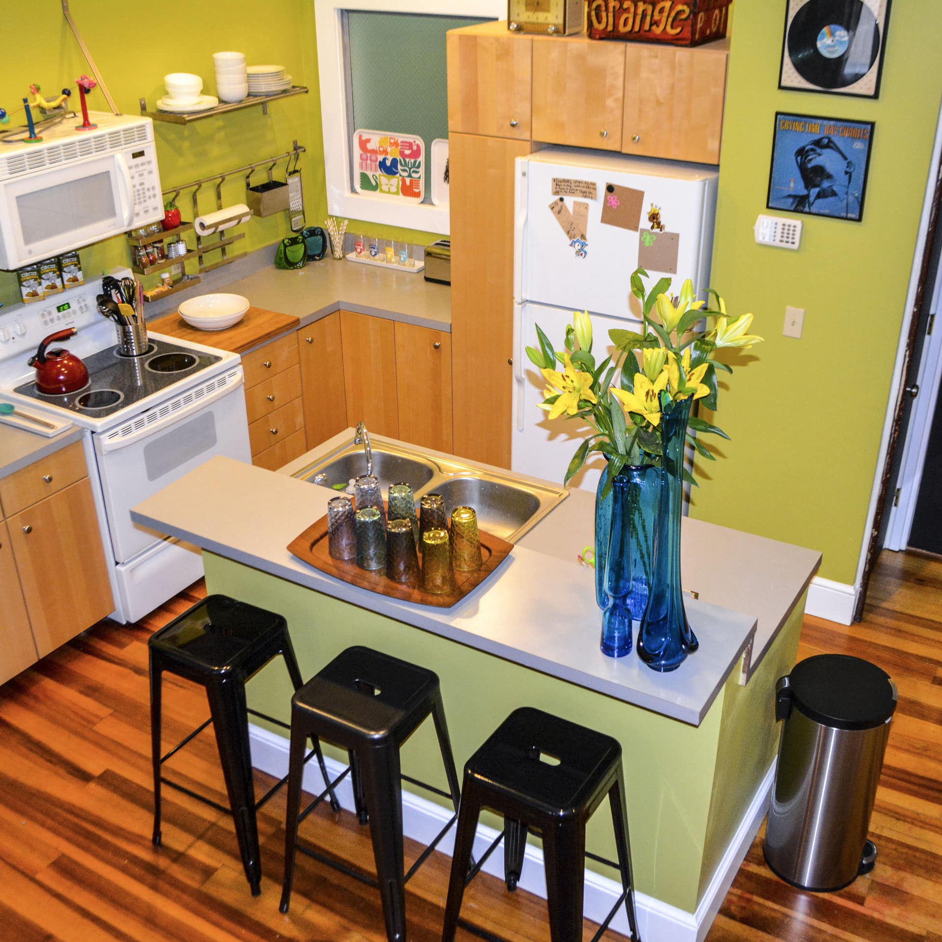 A pet-friendly vacation home rental's compact and colorful kitchen