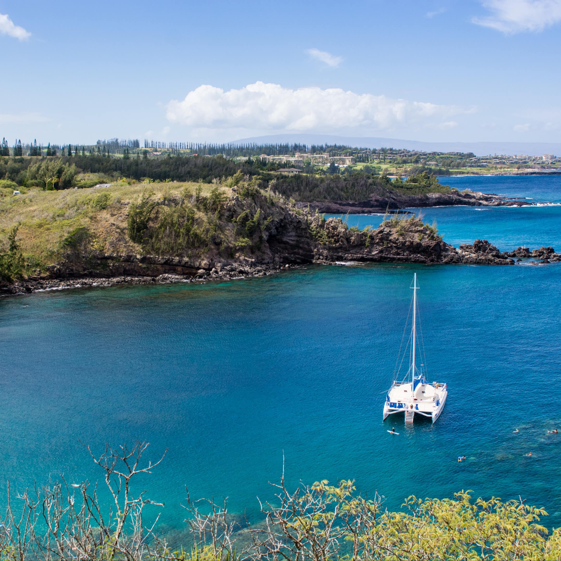 A boat sailing off the coast of Maui