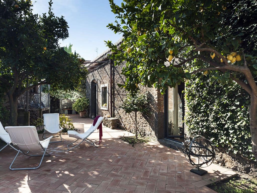This is a winery in Trecastagni, Italy that has been converted into a three bedroom home