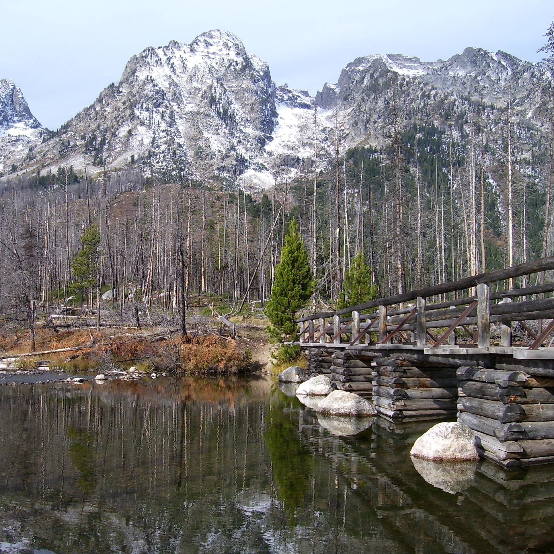 Snow-capped mountains overlooking a lake