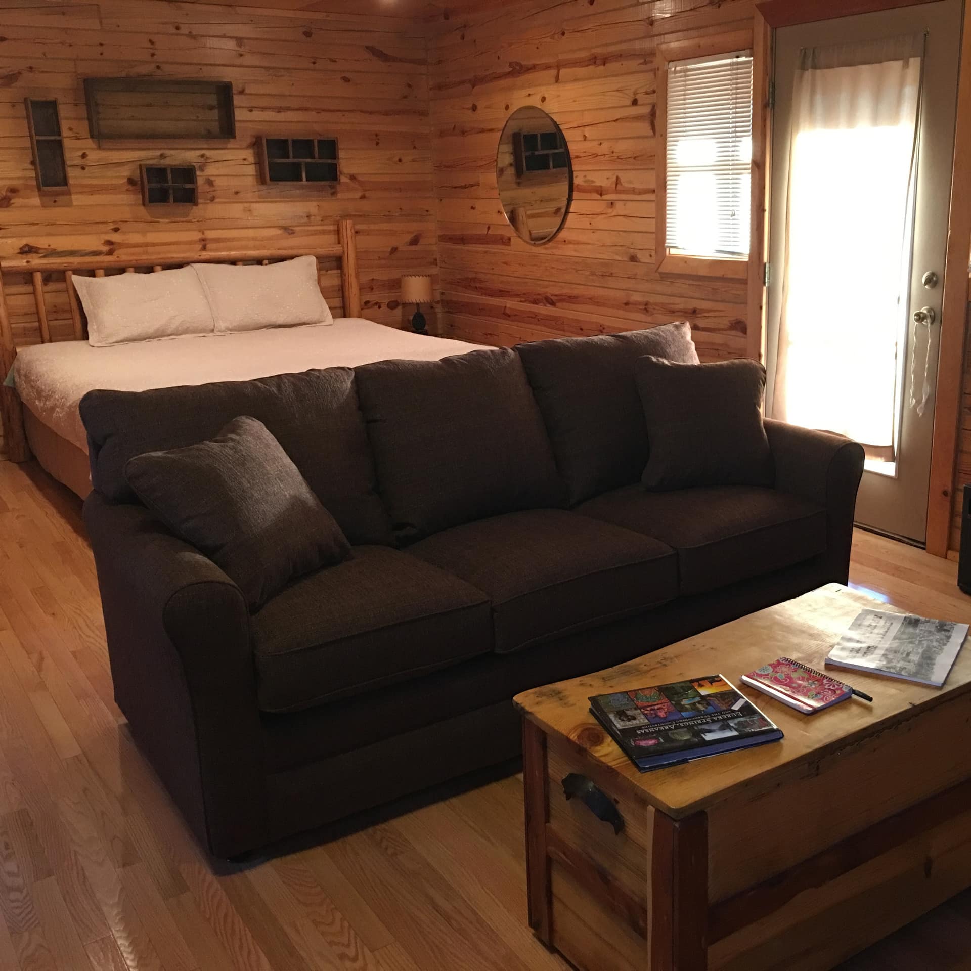 Wood interiors of a studio-type Eureka Springs cabin rental that’s perfect for 2