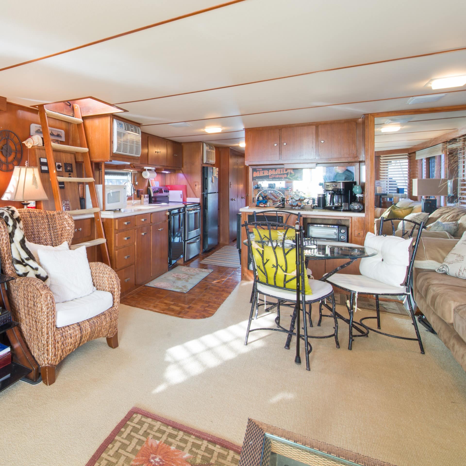 The inviting interior living space on a modern houseboat