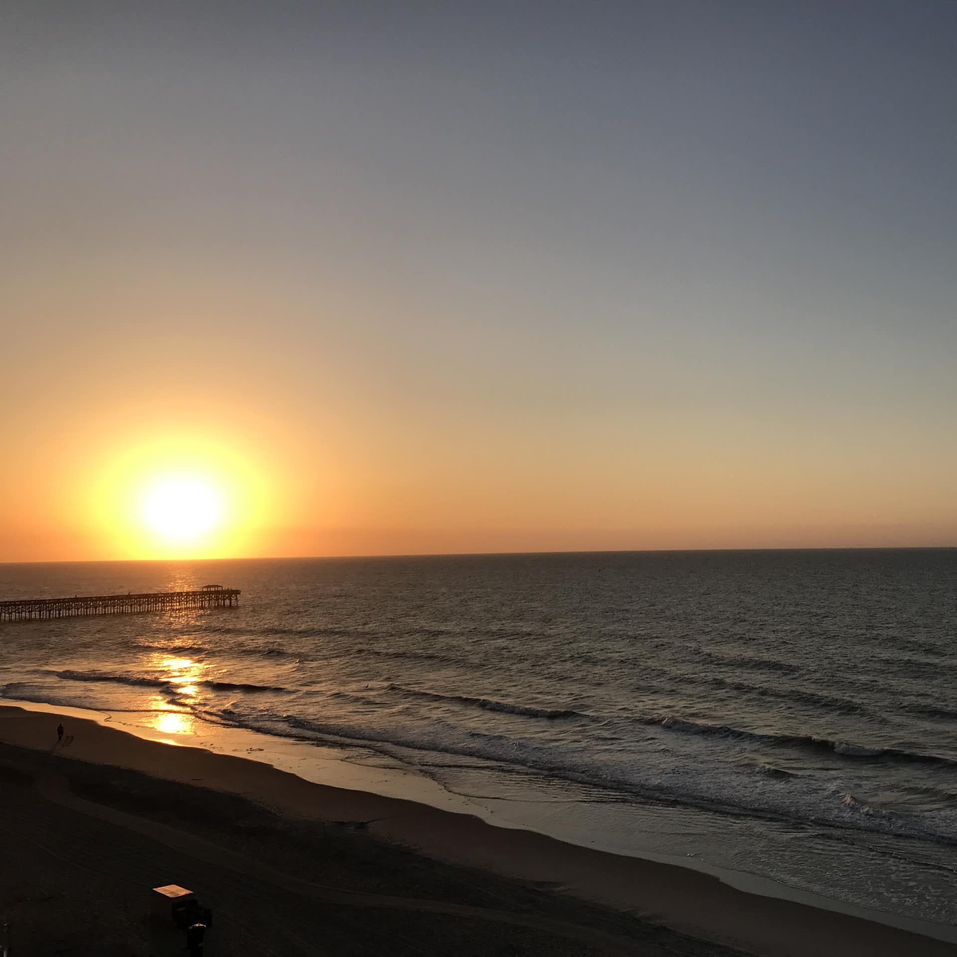 Sunrise over a jetty in Myrtle Beach