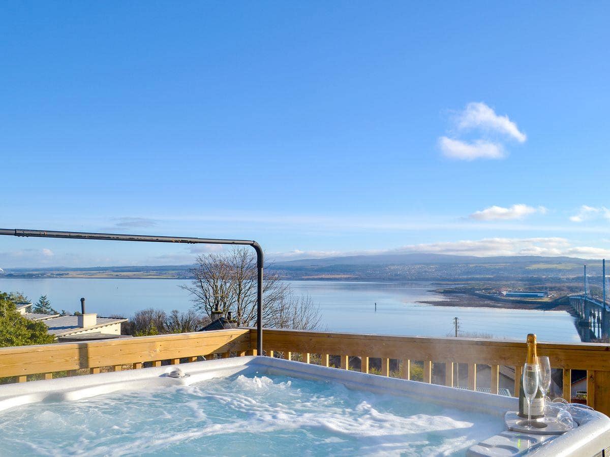 This 5-bedroom home features panoramic views of Moray Firth