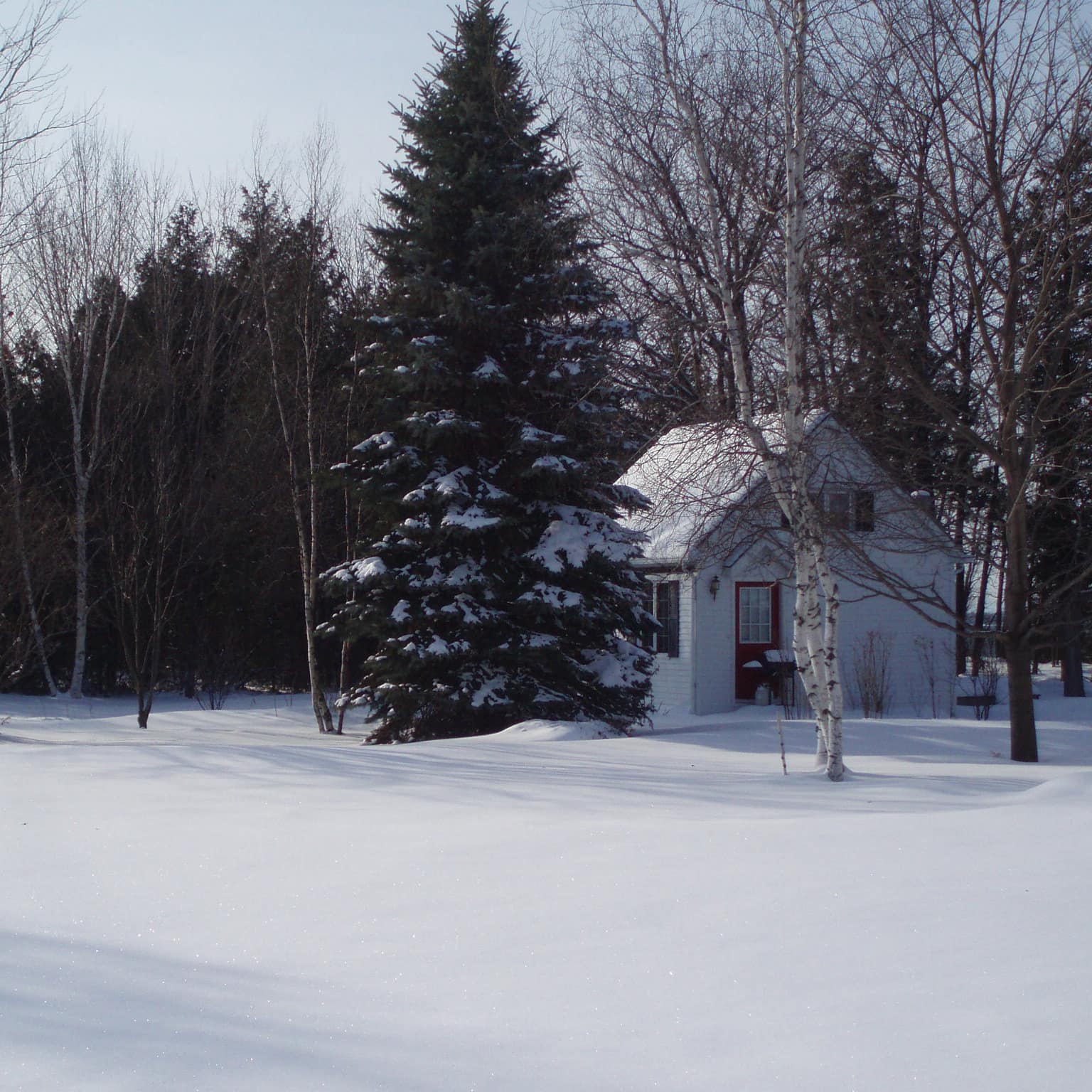 A vacation home rental stands in the snow near Lake Champlain
