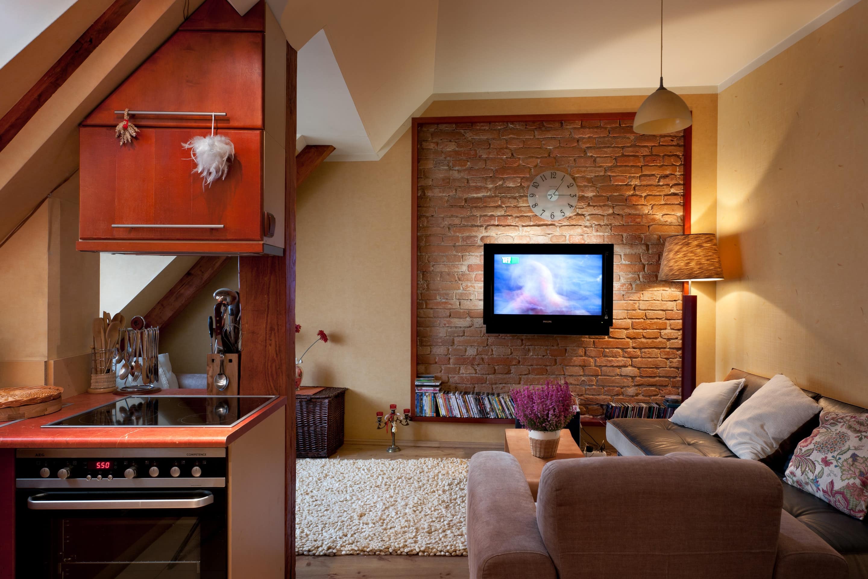 This 2-bedroom penthouse apartment is located in central Riga