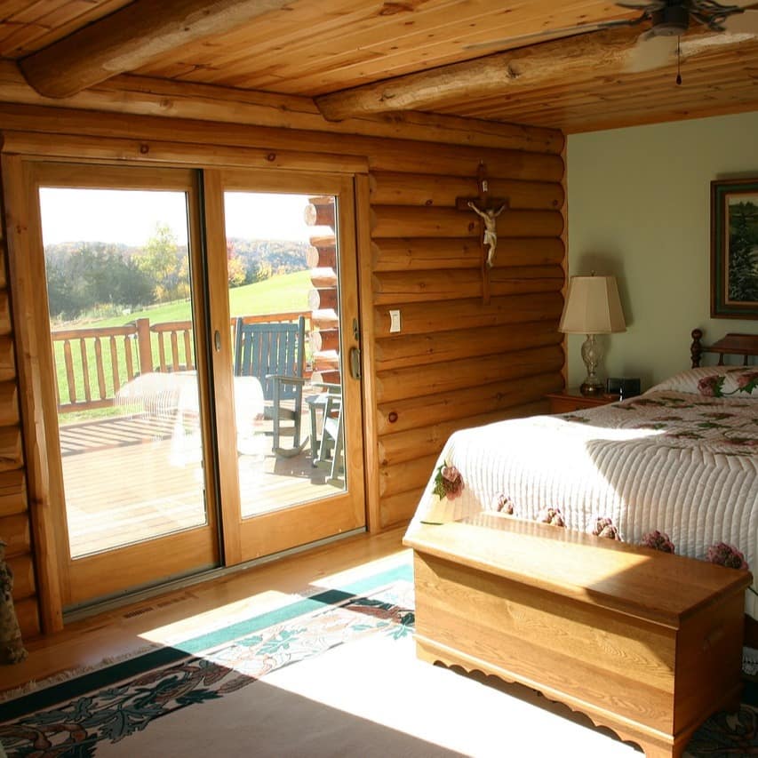 Master bedroom in a log cabin