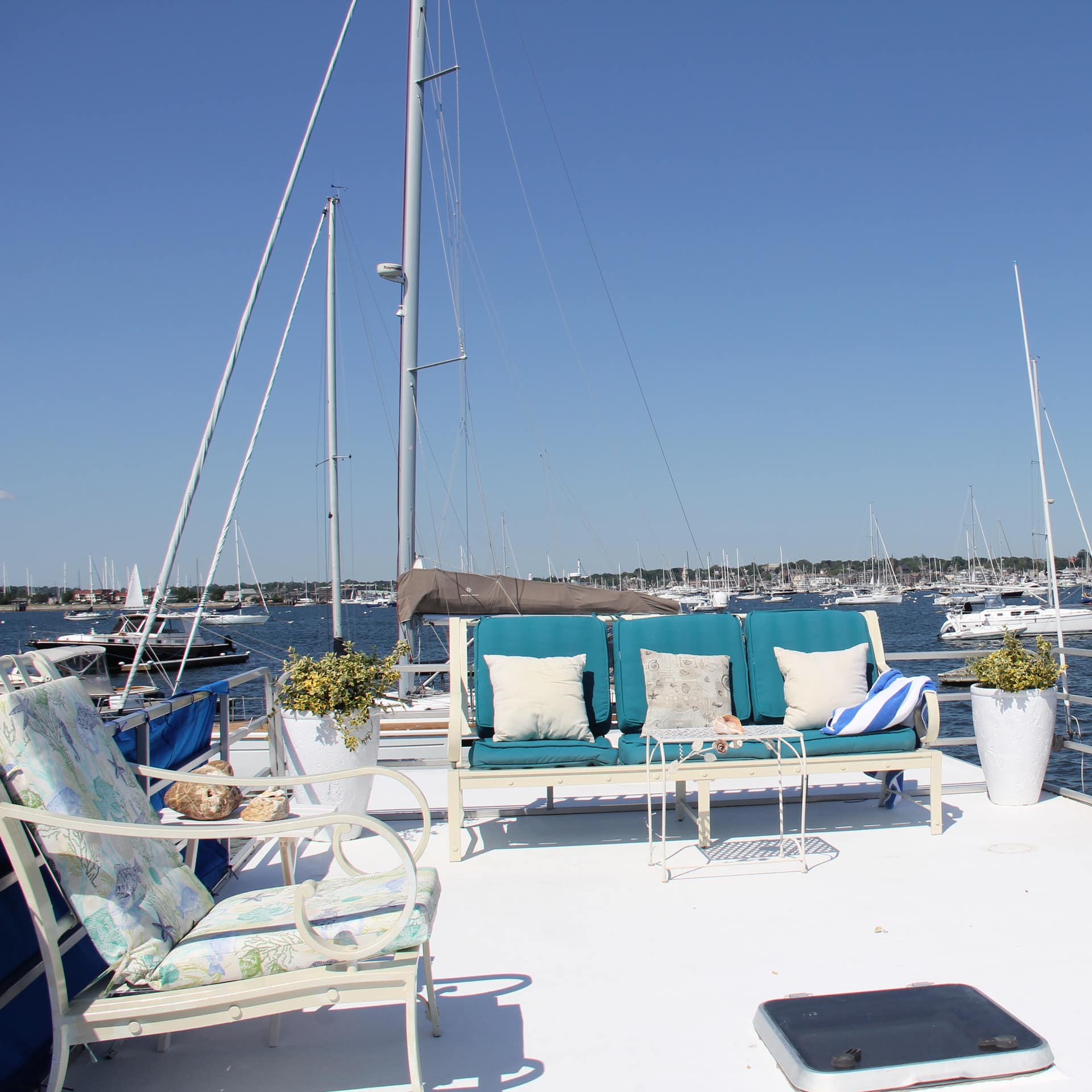 The open-air deck of a boat rental in the docks of Newport