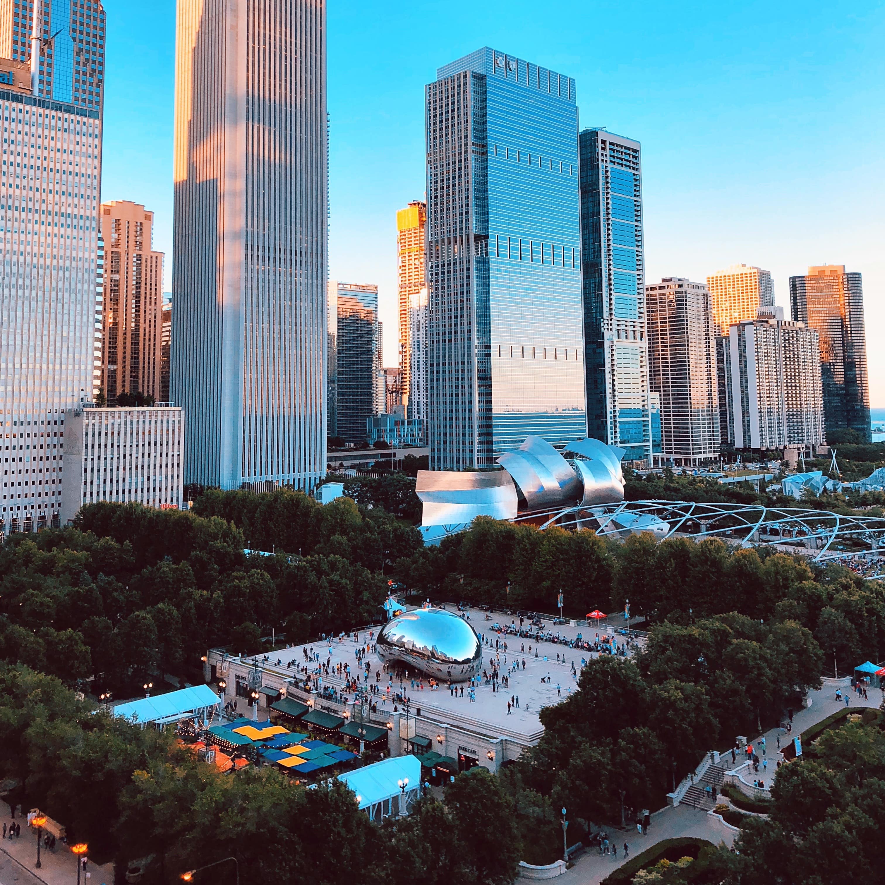 A view of the verdant Millennium Park framed by Chicago's sleek skyscrapers