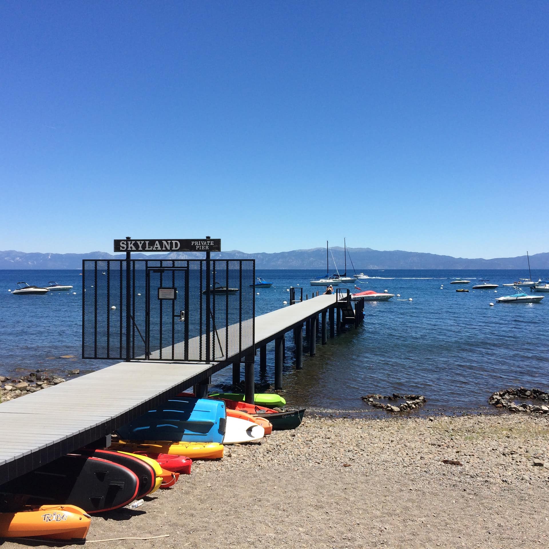 Boats bob in Lake Tahoe near the Skyland Private Pier