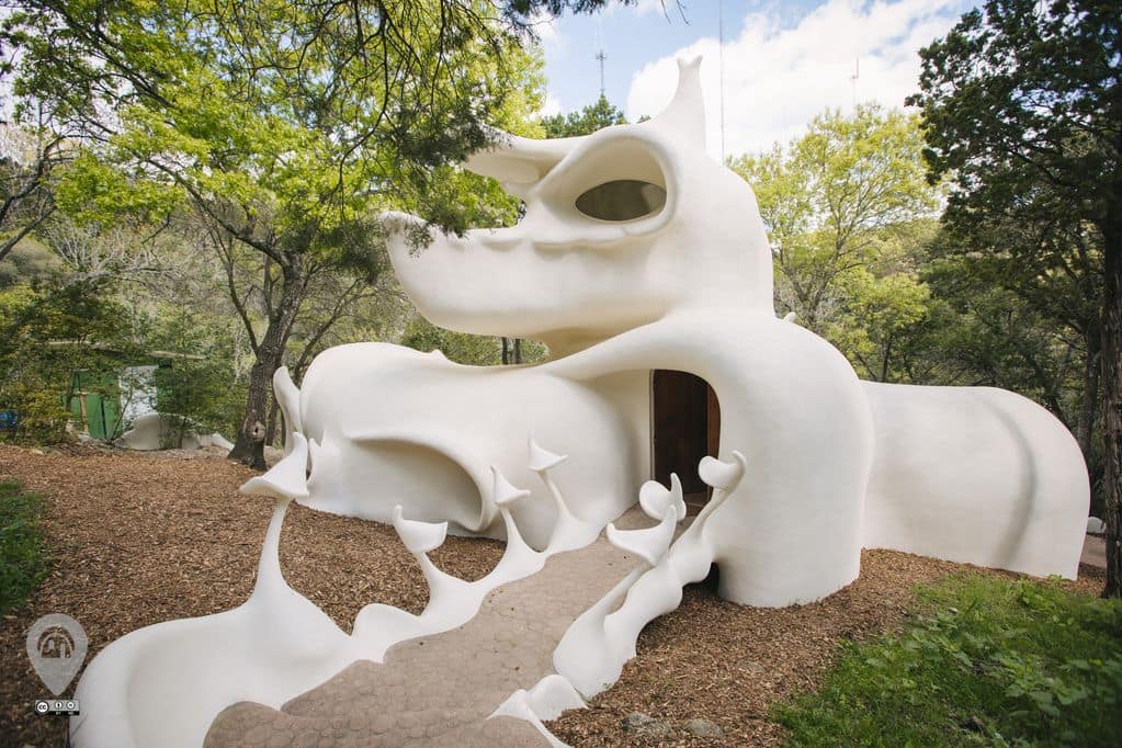 This home in Austin, Texas, looks like a large white wolf in the woods.