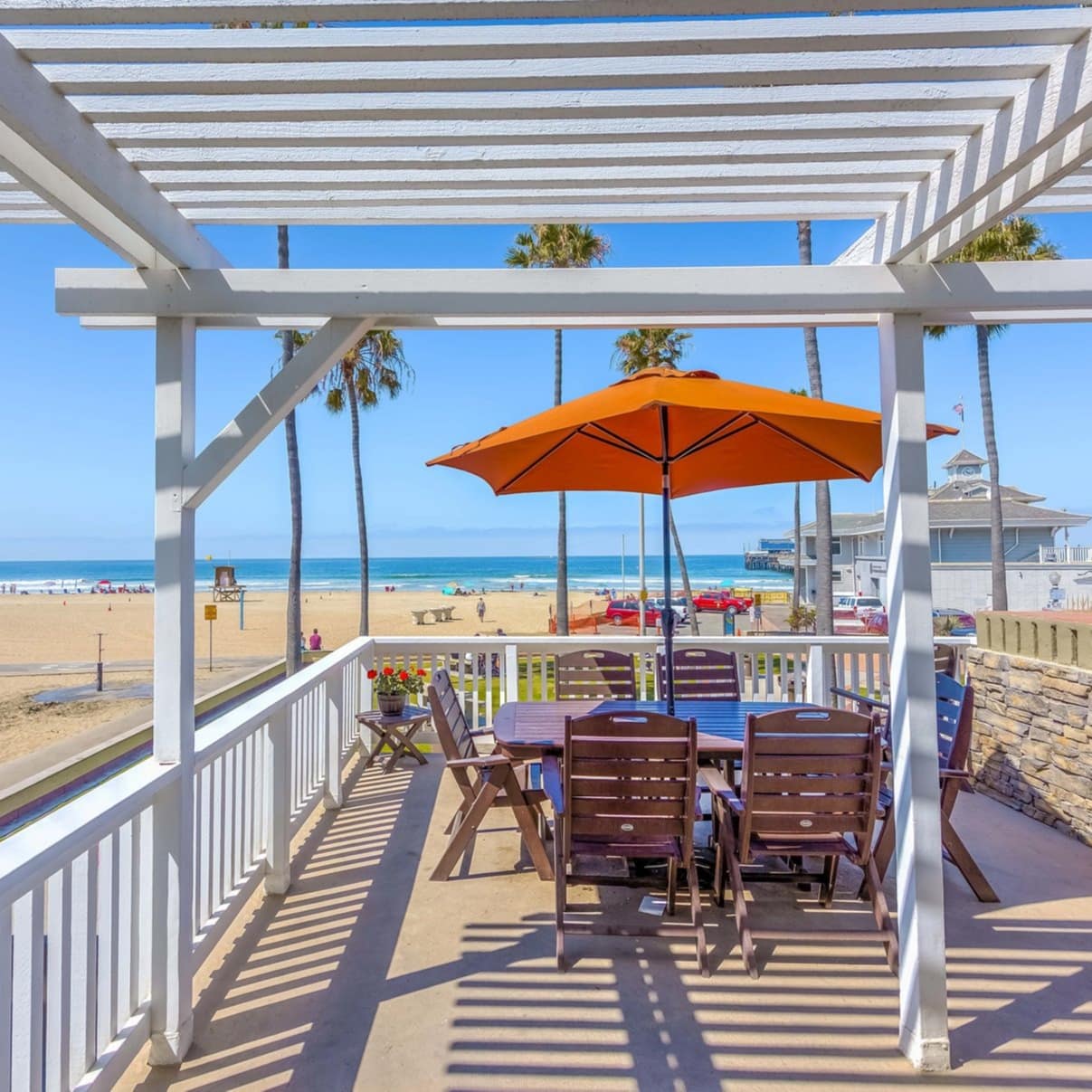 The deck of a house in Newport Beach that overlooks the sands and the Pacific Ocean