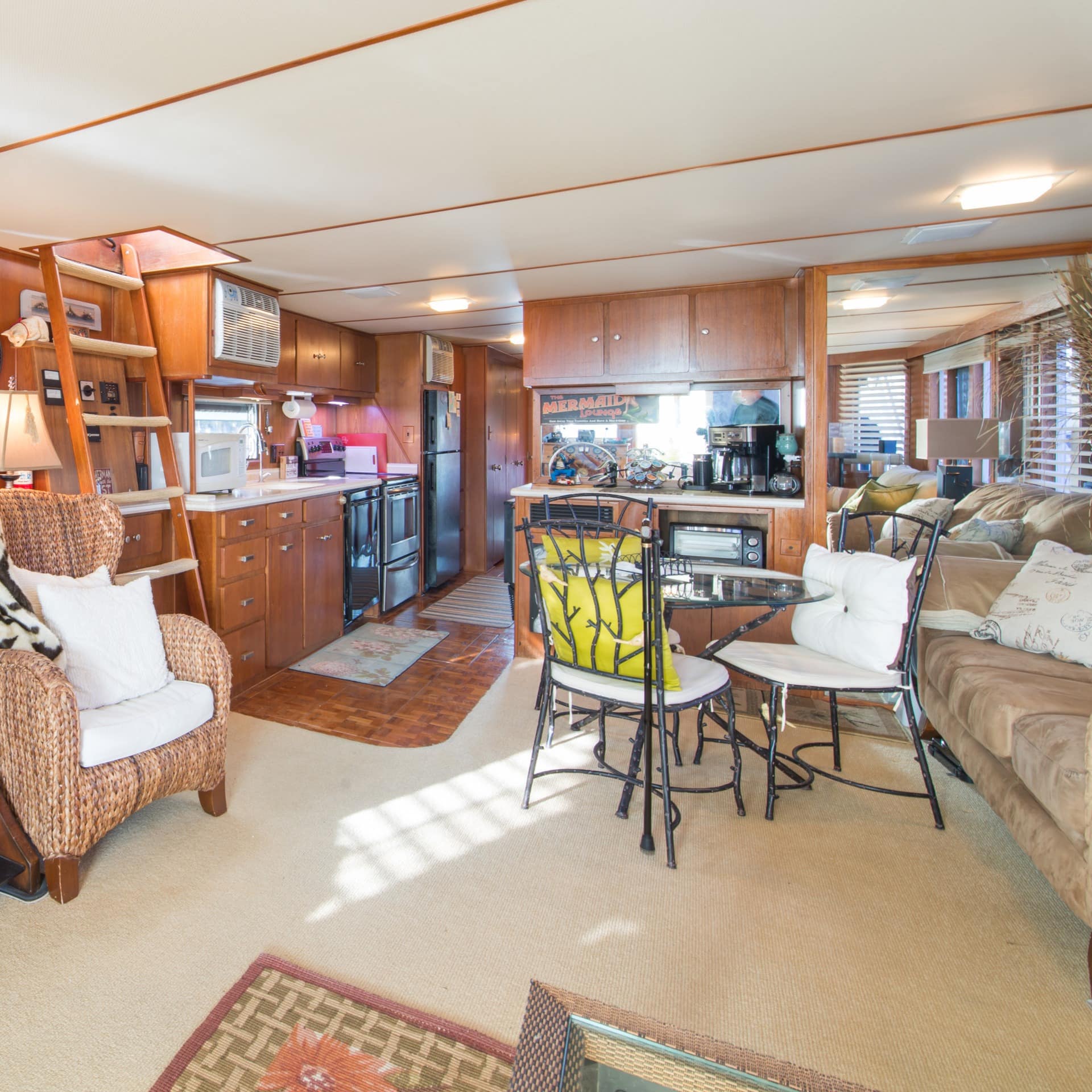 The comfortable and inviting living space inside a modern houseboat