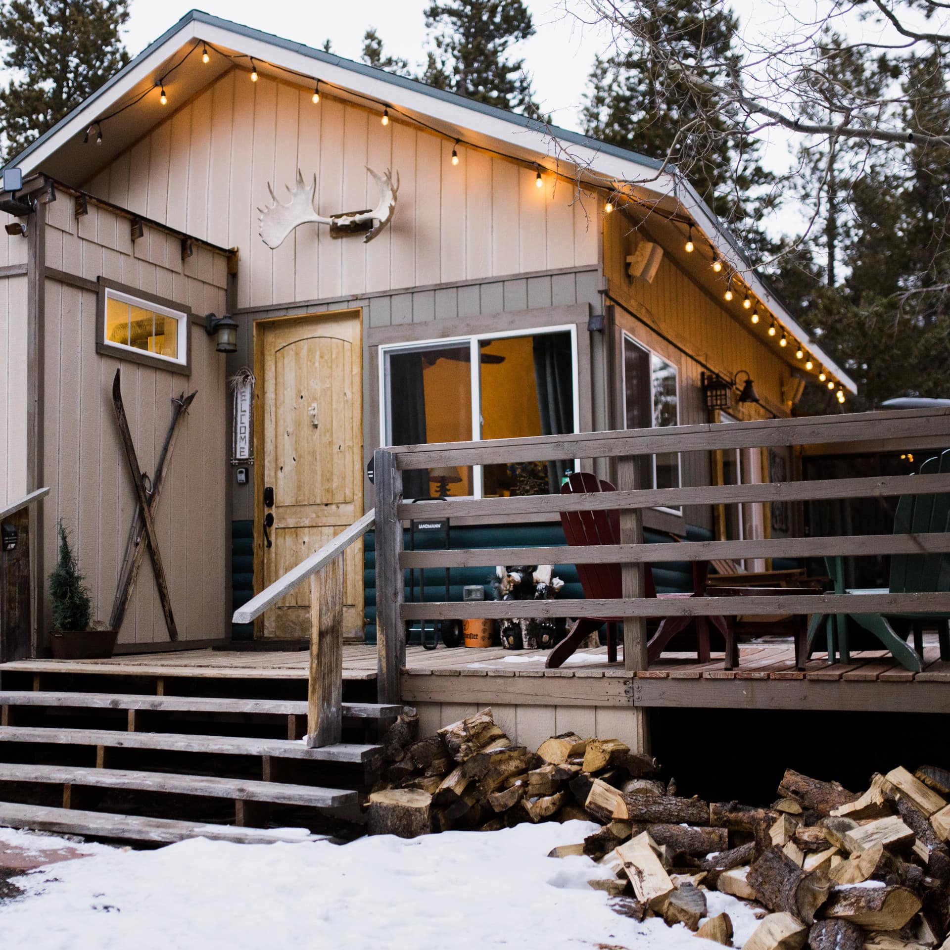 This cozy log cabin near Boulder provides warm shelter in the snowy winter.