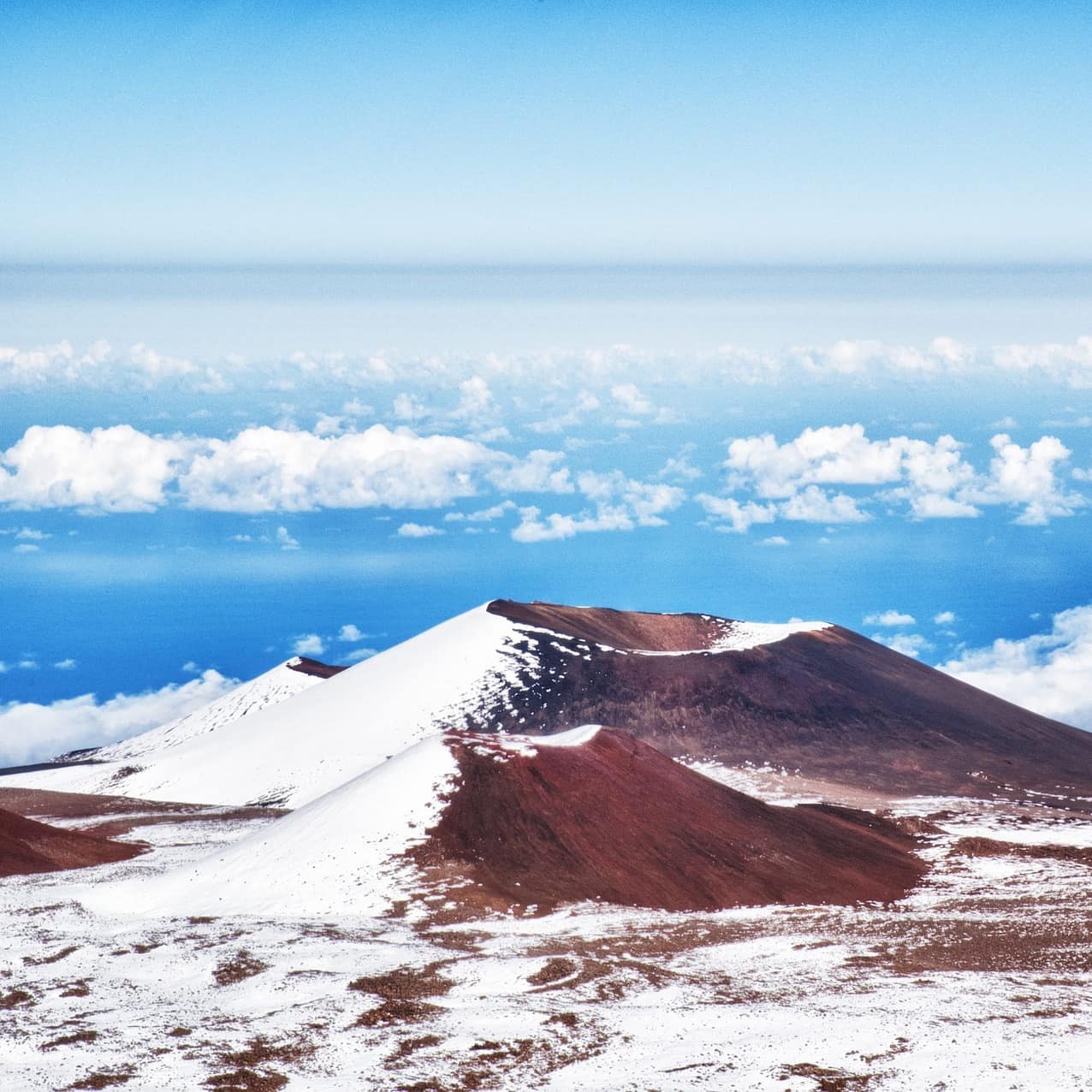 The snow-covered summit of Mauna Kea volcano.