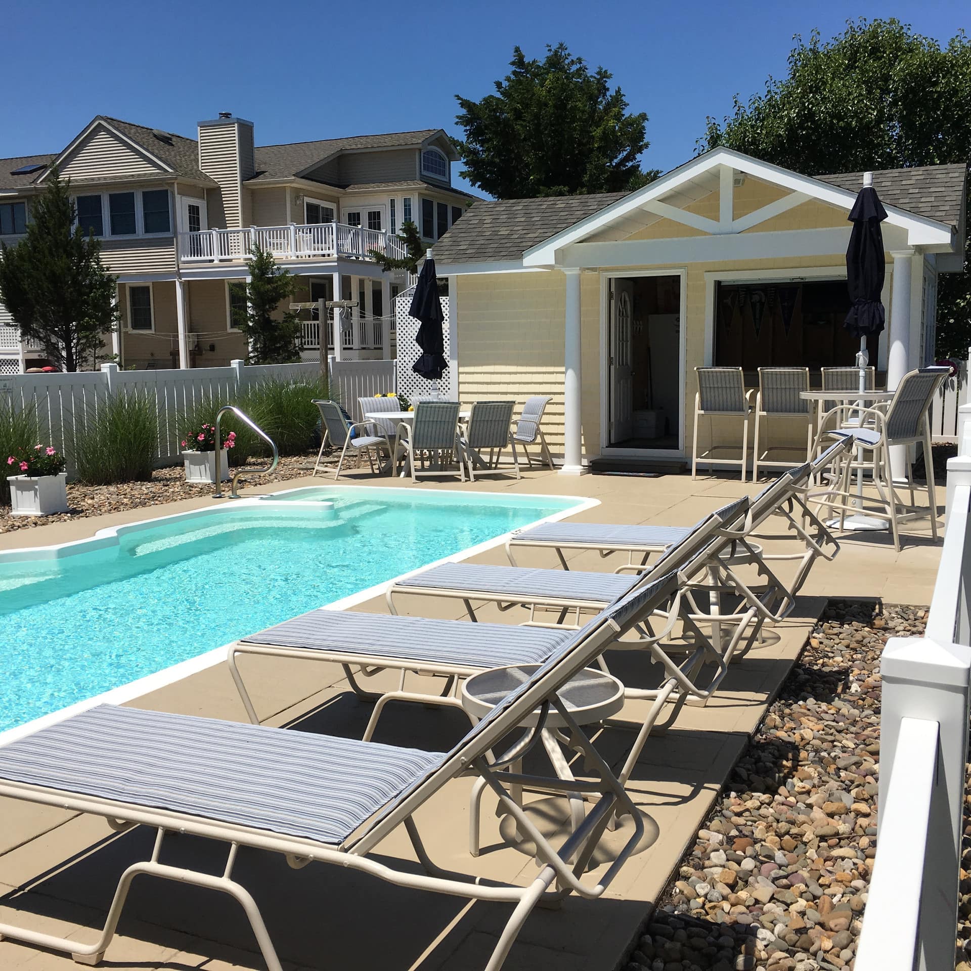 A classic Stone Harbor beach house rental with a pool