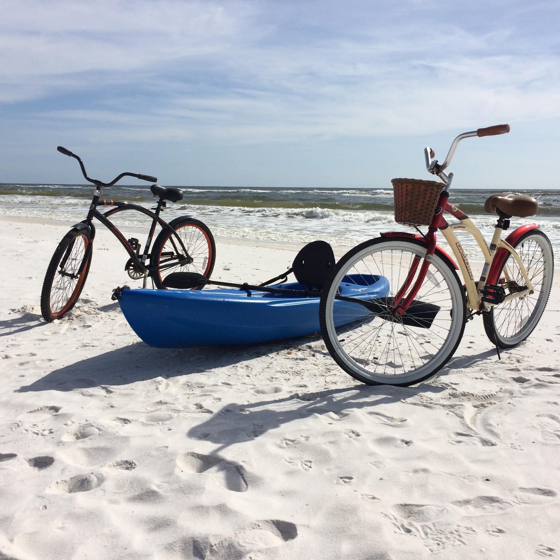 Bikes and a kayak wait on the powdery sands of Fort Walton Beach