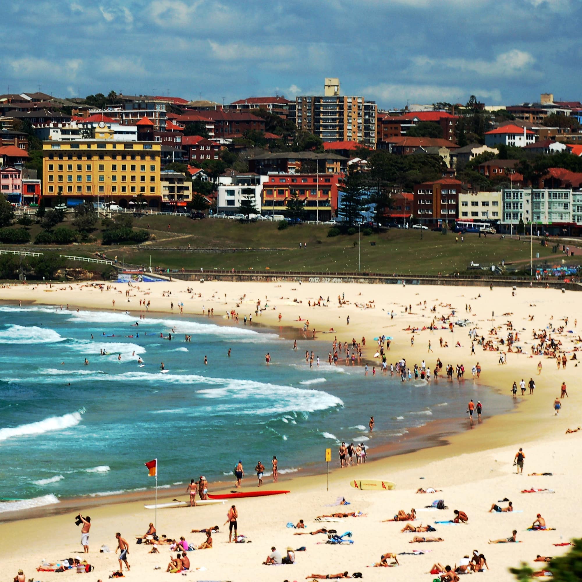 People relax on Bondi Beach in Sydney
