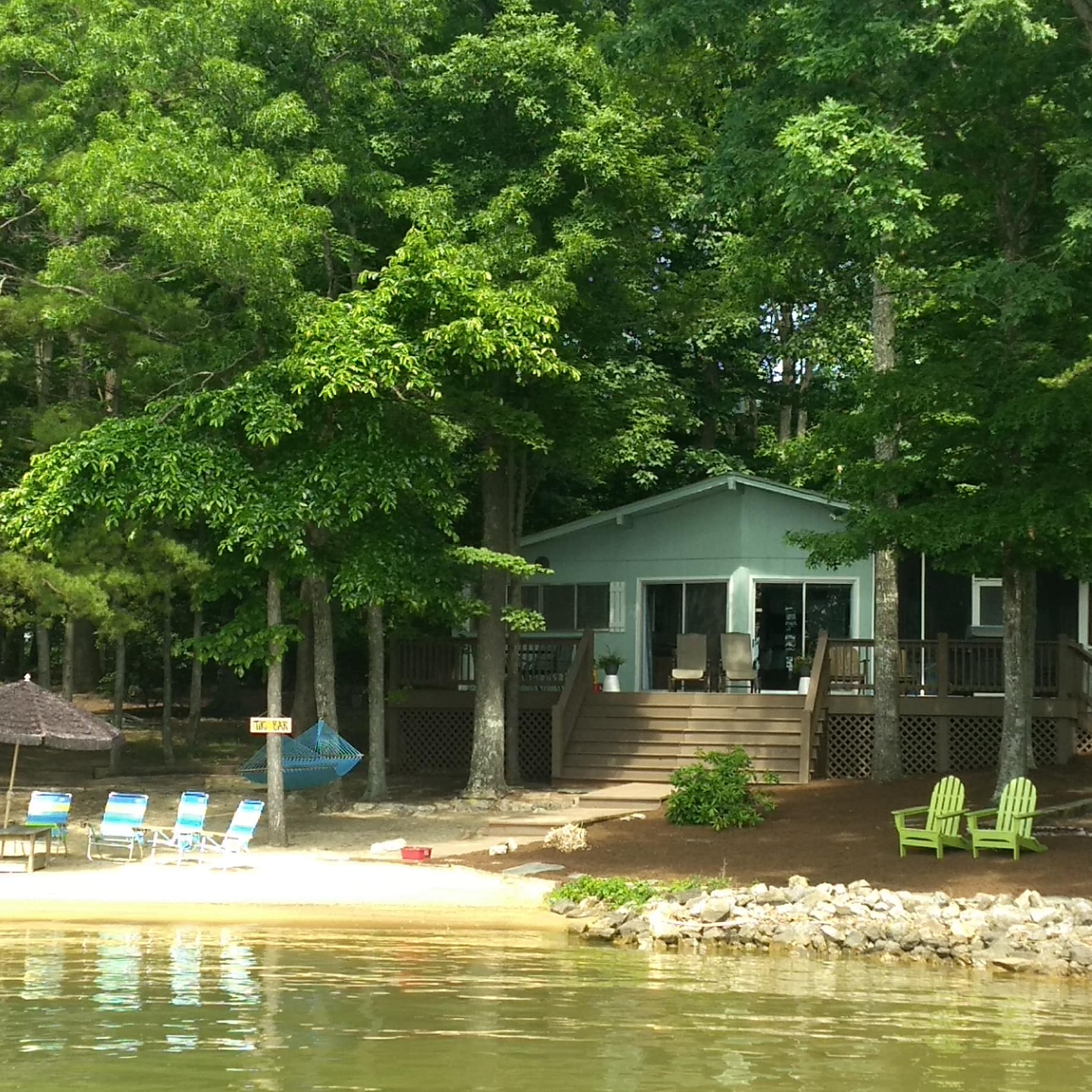 A lakefront vacation rental with a private beach in Huddleston, Smith Mountain Lake