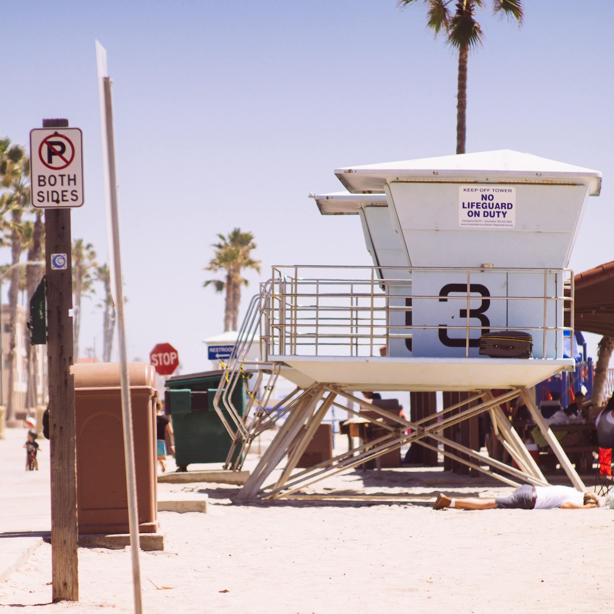 A lifeguard stand lines the boardwalk in Oceanside