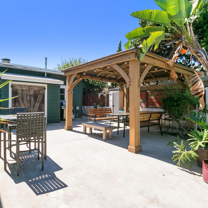 The leafy garden of an Ocean Beach rental