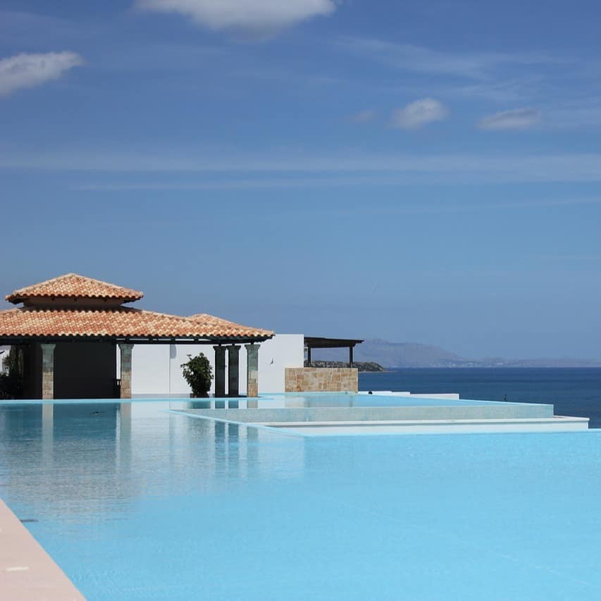 A vacation villa with infinity pool offering ocean views