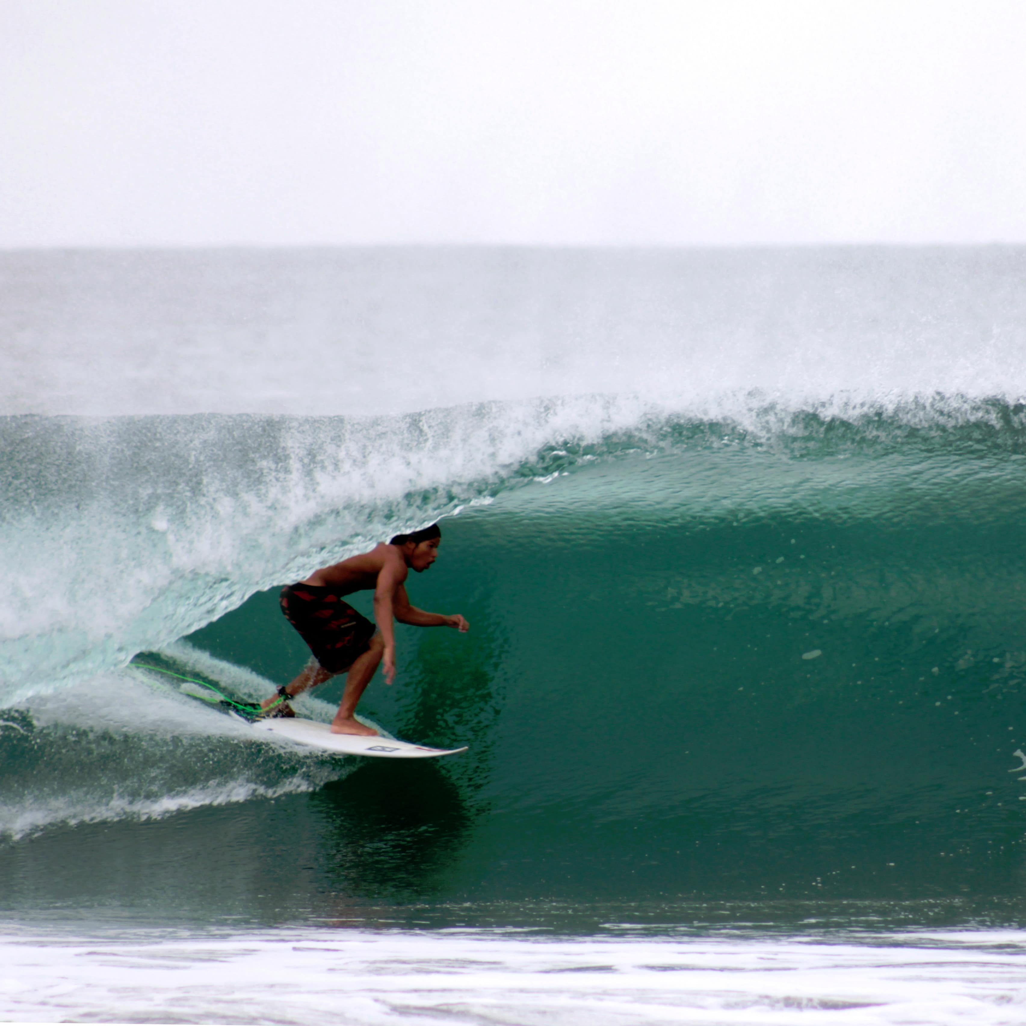A man surfing a wave in Mexico
