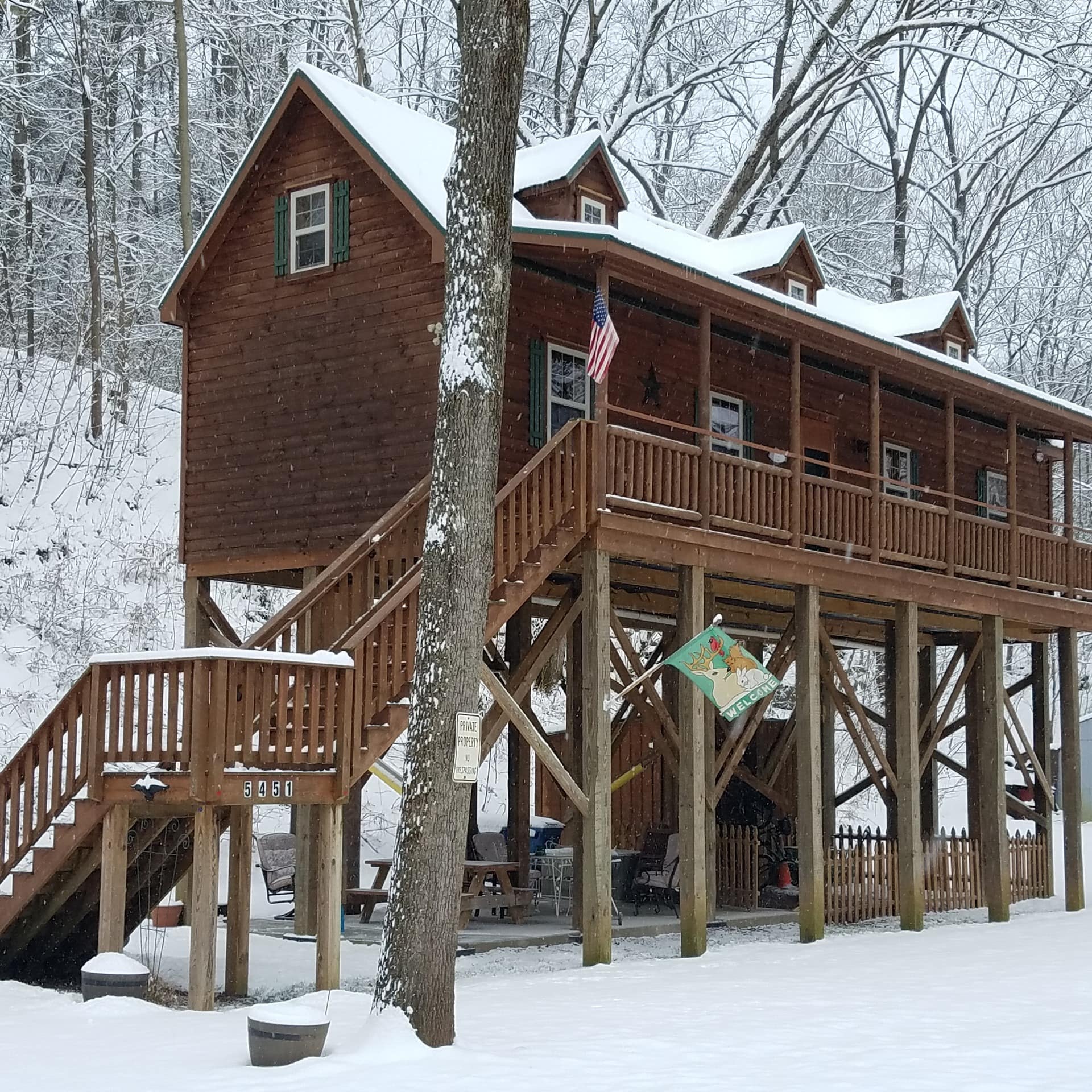 A cabin on stilts in the snow