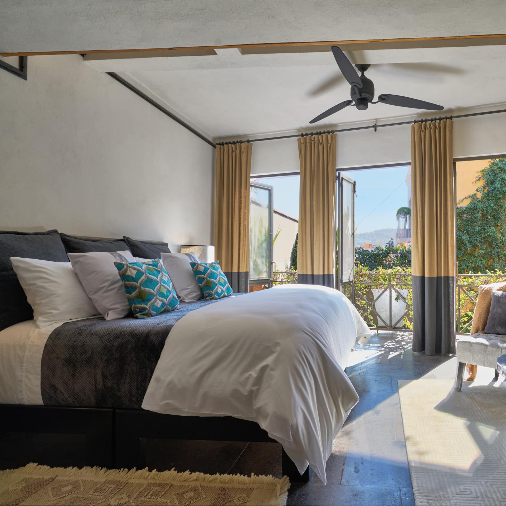 Stylish, light-filled bedroom in a luxurious apartment rental in San Miguel de Allende