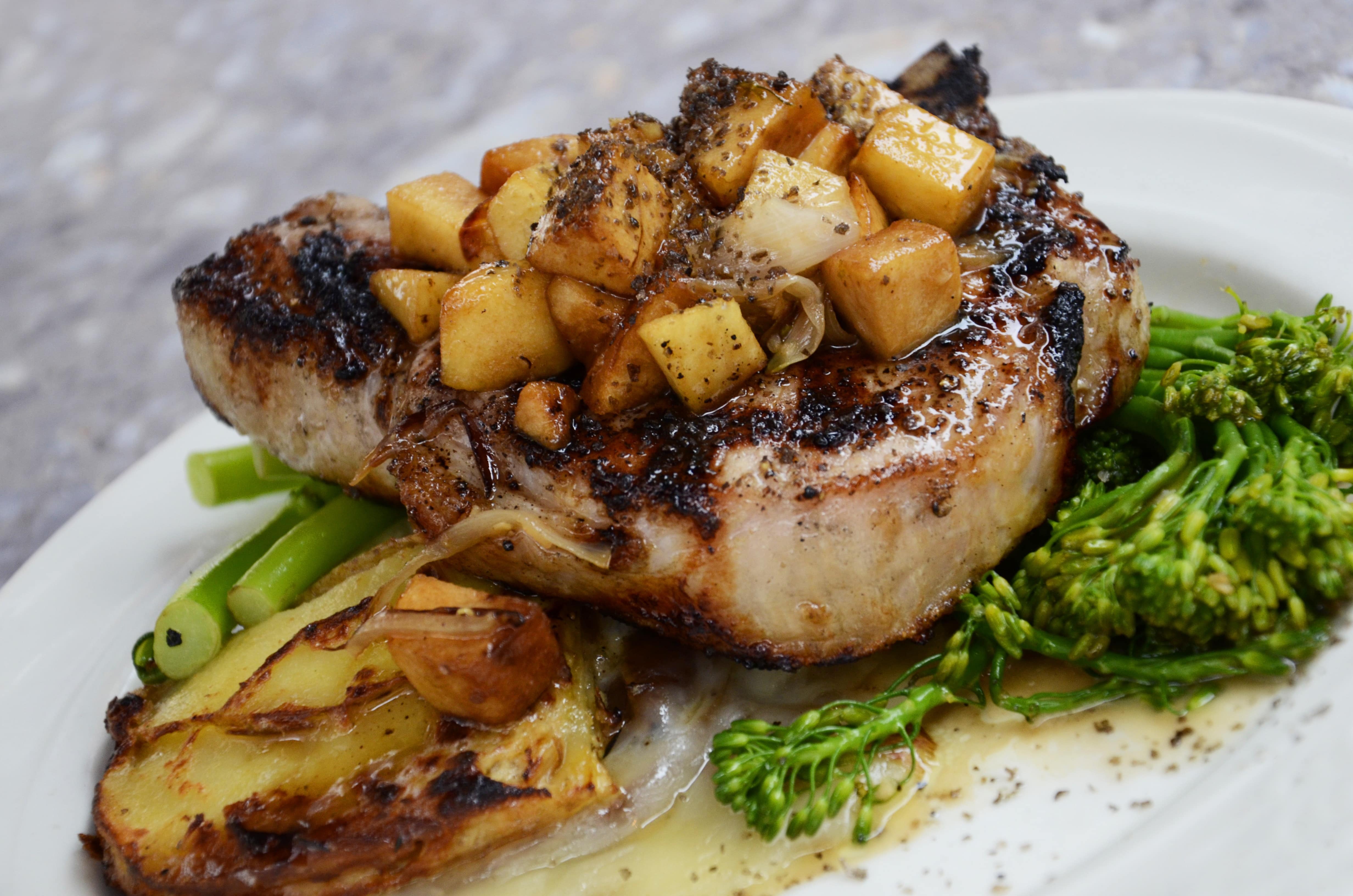 paris - Food stock image of pork chops with veg - Photo by Alex Munsell
